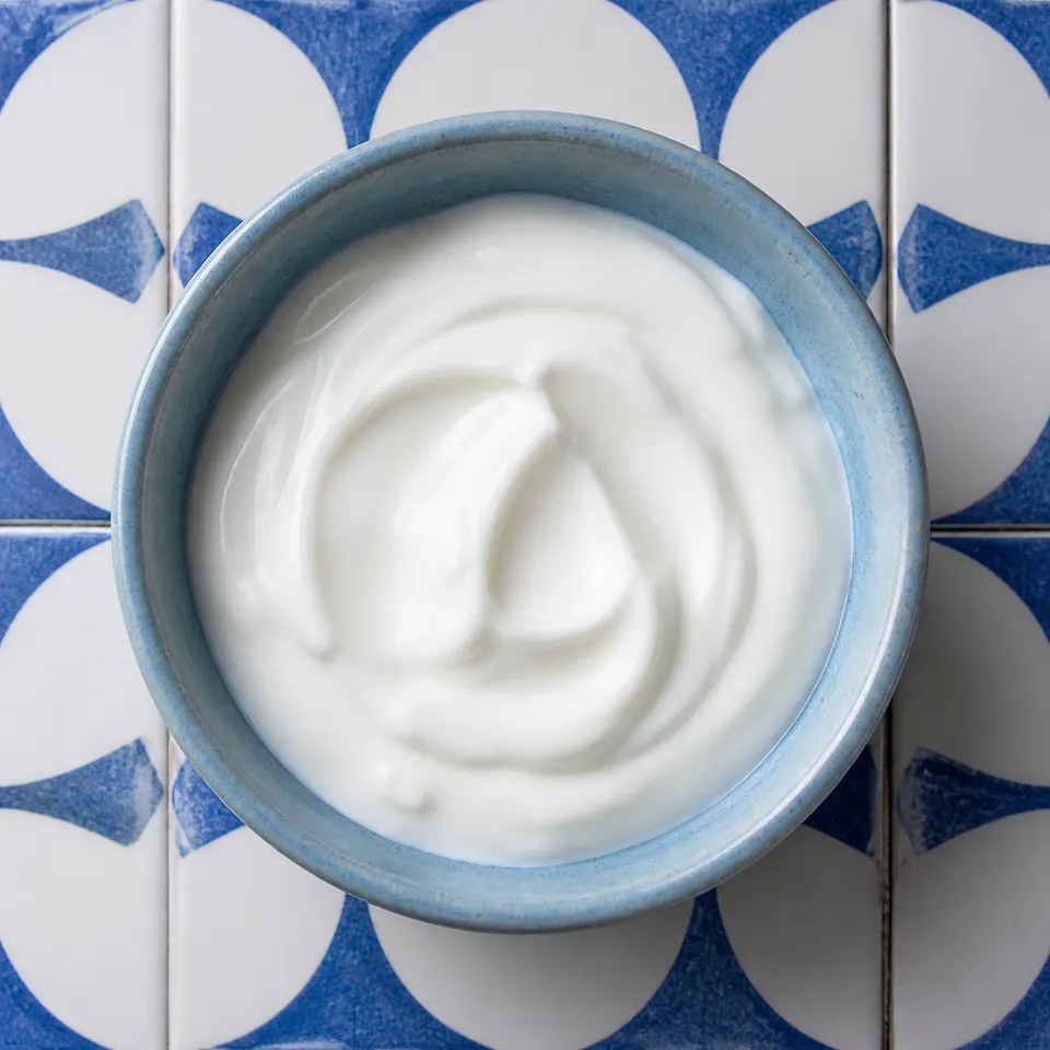 Plain nonfat Greek yogurt in a ceramic bowl