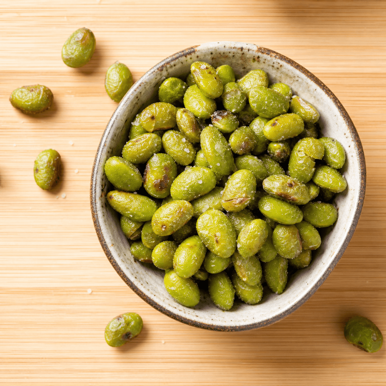 Dry roasted edamame in a small bowl