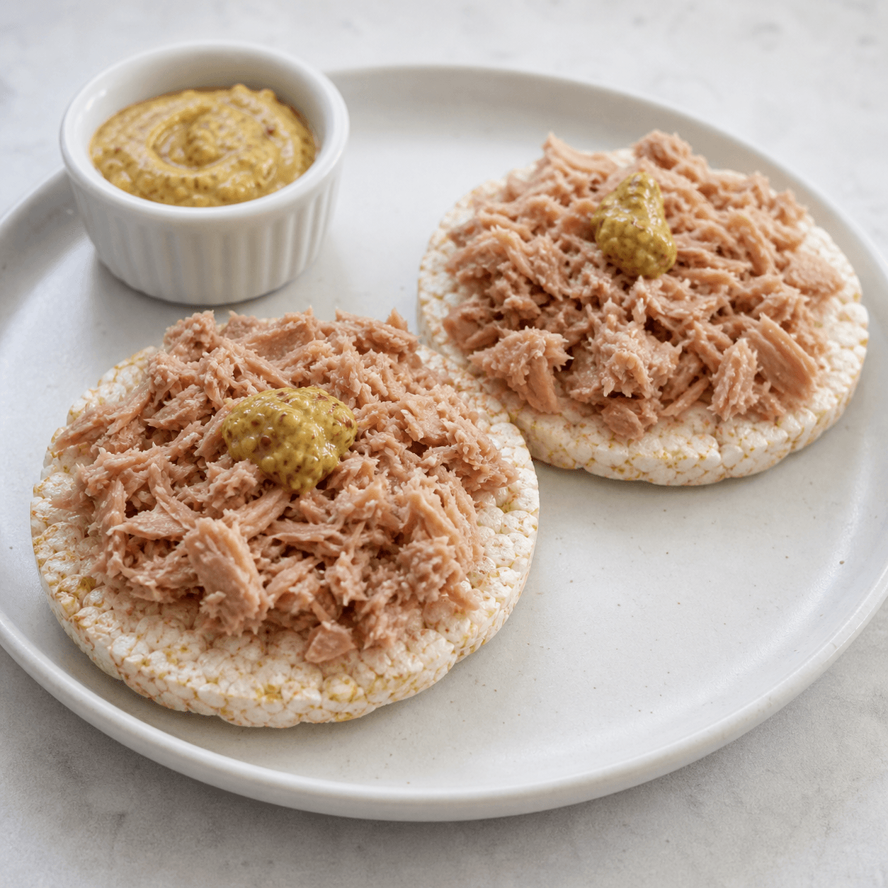 Tuna spread on two rice cakes