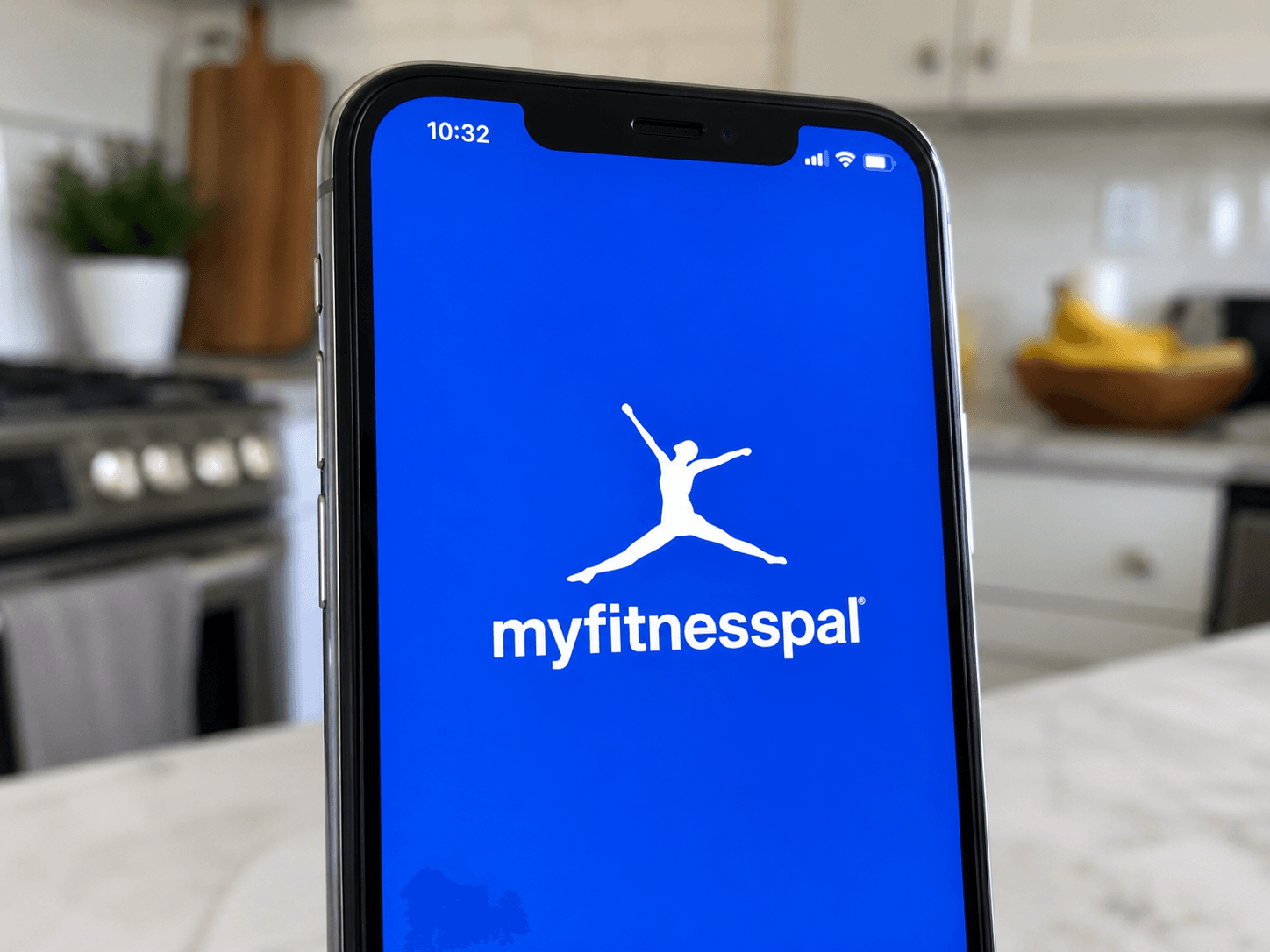 A close-up of an iPhone screen showing the MyFitnessPal logo
